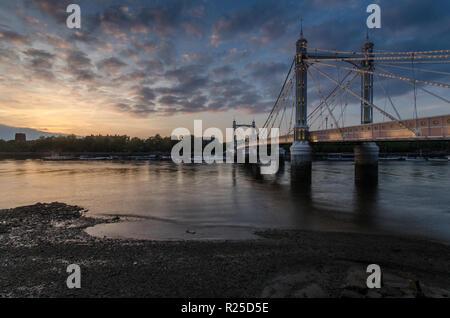 London, England, UK - May 30, 2014: The Albert Bridge, a suspension bridge crossing the River Thames between Chelsea and Battersea in west London, is  Stock Photo