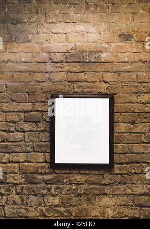 A Picture on grunge industrial red brick wall background in Kyiv, Ukraine. May be used in design and interiors. Stock Photo