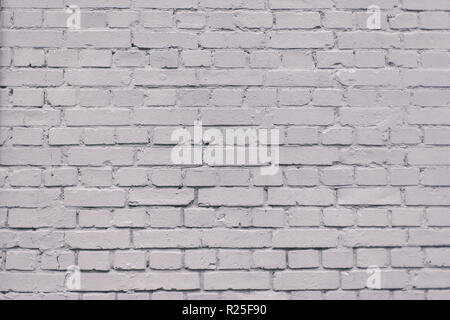 Grunge industrial grey painted brick wall background in Kyiv, Ukraine. May be used in design and interiors. Stock Photo
