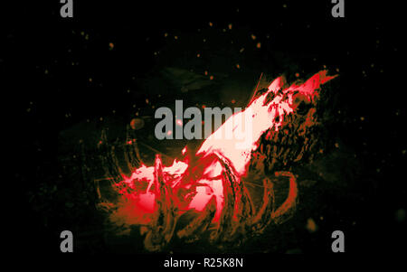 Bones in fire. Genre of horror. Scary background. Orange background color. Red background color. Stock Photo