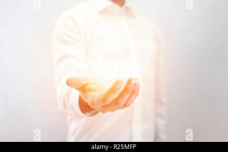 Light in man's hand Stock Photo