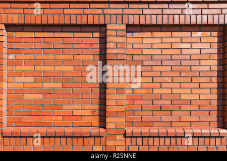 New brick wall with two square shallow niches Stock Photo