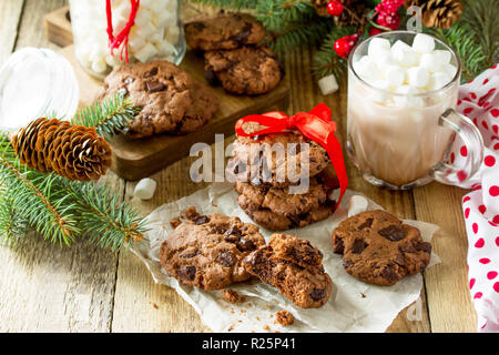 Baked Christmas cookies. Homemade Chocolate Chip Cookies on a wooden table. Stock Photo