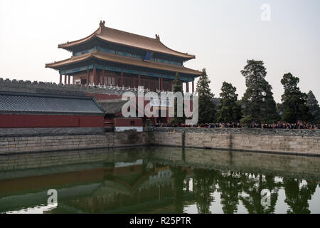 Crowds go through Gate of Divine Prowess in Forbidden City Stock Photo