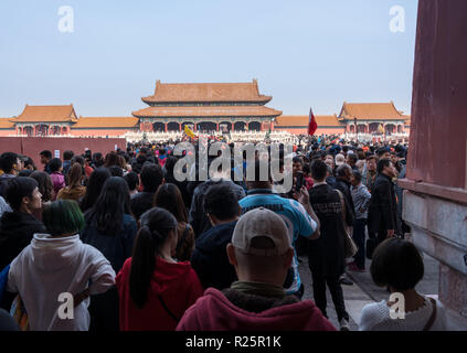 Crowds go through Meridian Gate in Forbidden City Stock Photo