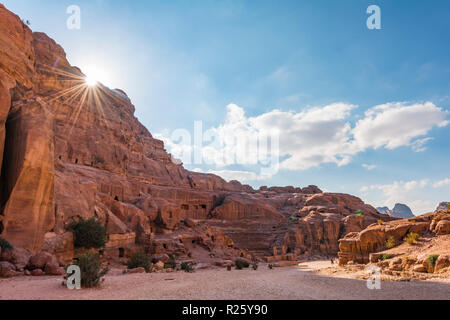 Houses carved in sandstone rocks, Nabataean town of Petra, near Wadi Musa, Jordan Stock Photo
