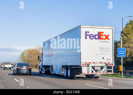 March 22, 2018 Sacramento / CA / USA - Fedex Express truck travelling on the freeway Stock Photo