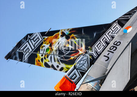 Royal Netherlands Air Force General Dynamics F-16 Fighting Falcon of 313 Squadron with special 60th anniversary artwork on the tail. Tiger scheme Stock Photo