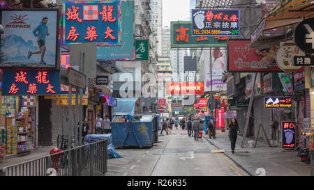 KOWLOON, HONG KONG - APRIL 21, 2017: Neons at Mong Kok Street in Kowloon, Hong Kong. Stock Photo