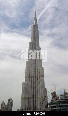 Looking up at the Burj Khalifa from the base of the base of the tallest building in the world in Dubai, UAE Stock Photo