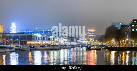 Looking down Bordeaux Quay to Pero's Bridge at night. Bristol. UK Stock Photo