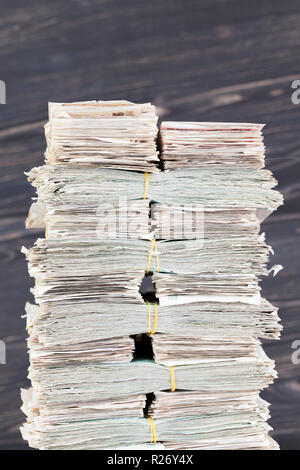 a lot of paper cash lays together in a big pile Stock Photo