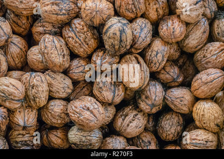 Walnuts in a bunch freshly harvested and delicious Stock Photo