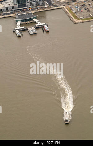 helicopter aerial view of ferry boat from NY Waterway, Port Imperial, Weehawken, New Jersey, USA Stock Photo