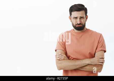 Smiling Young Man Posing In Style, Arms Crossed And Tattoo On His Hand  Stock Photo, Picture and Royalty Free Image. Image 15338519.