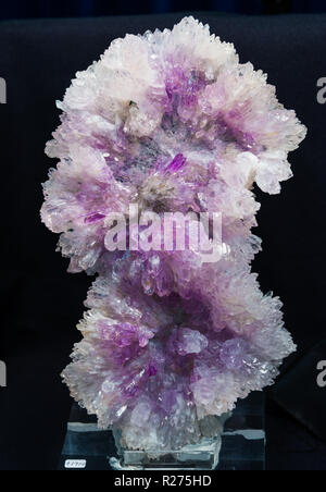 Amethyst and clear quartz crystals in cluster. Stock Photo