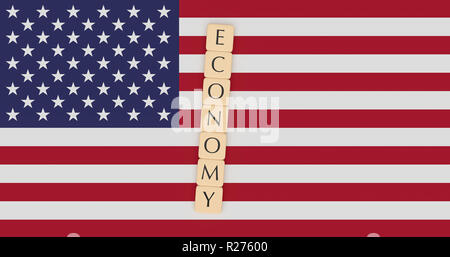 USA Business Concept: Letter Tiles Economy On US Flag 3d illustration Stock Photo