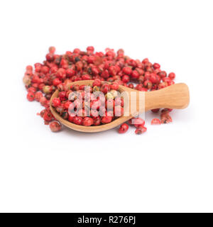 pink peppercorns isolated on white background, dried berries of Peruvian pepper tree Stock Photo