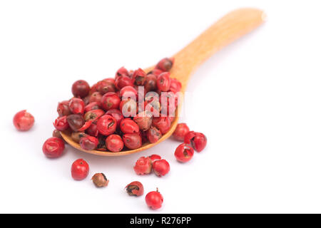pink peppercorns isolated on white background, dried berries of Peruvian pepper tree Stock Photo