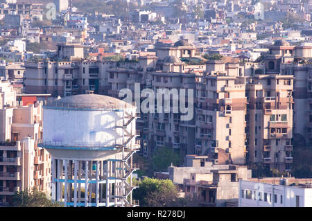 Aerial shot of water tower in the middle of locality Stock Photo