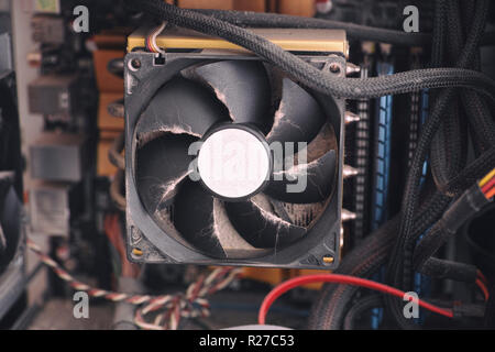 Dust on CPU cooling fan inside of a PC computer. Close up. Stock Photo