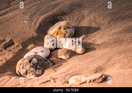 Sand and pebble rocks Stock Photo