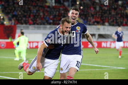 Scotland's Ryan Fraser (left) celebrates scoring his side's first goal of the game with team-mate Ryan Christie during the UEFA Nations League, Group C1 match at the Loro Borici Stadium, Shkoder. Stock Photo