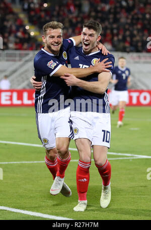 Scotland's Ryan Fraser (left) celebrates scoring his side's first goal of the game with team-mate Ryan Christie during the UEFA Nations League, Group C1 match at the Loro Borici Stadium, Shkoder. Stock Photo