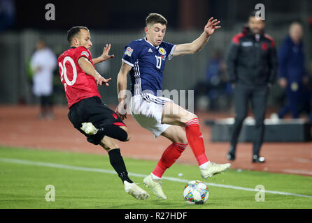 Albania's Ergys Kace (left) and Scotland's Ryan Christie battle for the ball during the UEFA Nations League, Group C1 match at the Loro Borici Stadium, Shkoder. Stock Photo