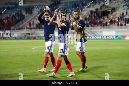 Scotland's Stuart Armstrong, Ryan Christie and Steven Fletcher applaud the fans after the final whistle during the UEFA Nations League, Group C1 match at the Loro Borici Stadium, Shkoder. Stock Photo