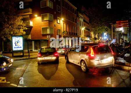 Cars queing to enter the multi-storey car park in the Place des Carmes, Toulouse, France Stock Photo