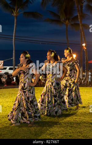 Kailua-Kona, Hawaii - The dancers of Halau Kaâ€™eaikahelelani perform traditional hula at the Coconut Grove Marketplace on Hawaii's Big Island. Stock Photo