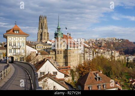 Fribourg, Switzerland, view of the Lower Town with in the background, the St. Nicholas Cathedral and the Gottéron Bridge. Stock Photo