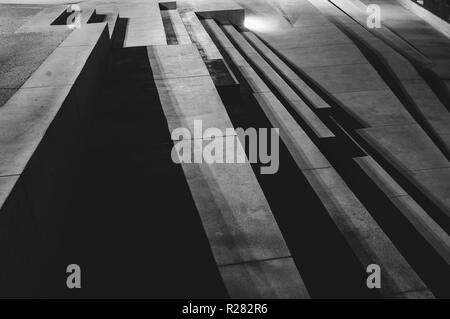 Stairs and shadows in the night, abstraction. Embankment of Il-Birgu, Malta Stock Photo