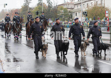 European street, Prague-October 28, 2018: Police workers with service dogs are marching on military parade for 100th anniversary of creation Czechoslo Stock Photo