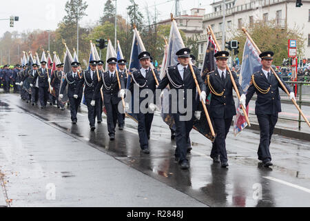 European street, Prague-October 28, 2018: Fire brigade workers  are marching on military parade for 100th anniversary of creation Czechoslovakia on Oc Stock Photo