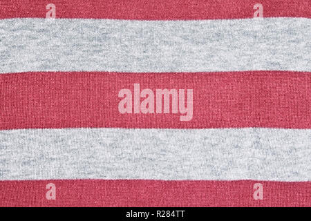 Knitted red-gray striped fabric texture background Stock Photo