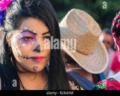 Oaxaca, Mexico - Oct 24 2018: woman with skull make up to celebrate the Day of the Dead Dias de los Muertos in Mexico Stock Photo