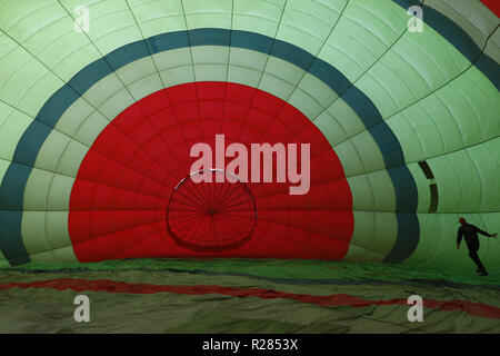 Pokhara, Nepal. 17th Nov, 2018. A man pulls the hot air balloon during the opening ceremony of Balloon Nepal in Pokhara, Nepal on Saturday, November 17, 2018. Credit: Skanda Gautam/ZUMA Wire/Alamy Live News Stock Photo