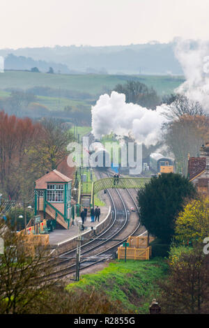 Corfe Castle, Dorset, UK.  17th November 2018. UK Weather.  A steam train on the Swanage Railway at Corfe Castle in Dorset leaving the station on a chilly and cloudy overcast morning.  Picture Credit: Graham Hunt/Alamy Live News Stock Photo