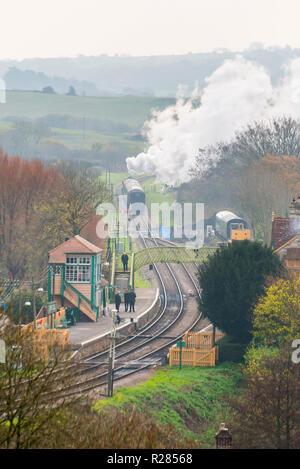 Corfe Castle, Dorset, UK.  17th November 2018. UK Weather.  A steam train on the Swanage Railway at Corfe Castle in Dorset leaving the station on a chilly and cloudy overcast morning.  Picture Credit: Graham Hunt/Alamy Live News Stock Photo