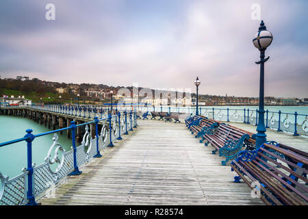 Swanage, Dorset, UK.  17th November 2018. UK Weather.  The pier at the seaside town of Swanage in Dorset on a chilly and cloudy overcast start to the morning.  Picture Credit: Graham Hunt/Alamy Live News Stock Photo