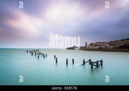 Swanage, Dorset, UK.  17th November 2018. UK Weather.  The remains of the old pier at the seaside town of Swanage in Dorset on a chilly and cloudy overcast start to the morning.  Picture Credit: Graham Hunt/Alamy Live News Stock Photo