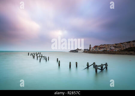 Swanage, Dorset, UK.  17th November 2018. UK Weather.  The remains of the old pier at the seaside town of Swanage in Dorset on a chilly and cloudy overcast start to the morning.  Picture Credit: Graham Hunt/Alamy Live News Stock Photo