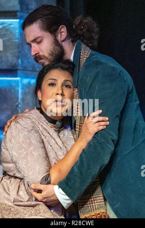 New York, USA, 17 November 2018. Mimi (soprano Sonja Krenek) is embraced by Rodolfo  (tenor Thomas Massey)  during a performance for kids of Giacomo Puccini's La Bohème by the New York City Opera.  Photo by Enrique Shore Credit: Enrique Shore/Alamy Live News Stock Photo