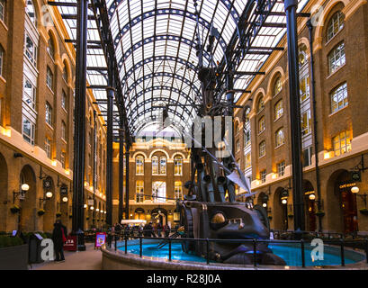 LONDON, UK - March 20 2018: Wide view of Hay's Galleria, which was originally a warehouse known as Hay's Wharf, then was redeveloped as mixed use reta Stock Photo
