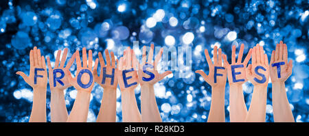 Hands Building Frohes Fest Means Merry Christmas, Glittering, Bokeh Background Stock Photo