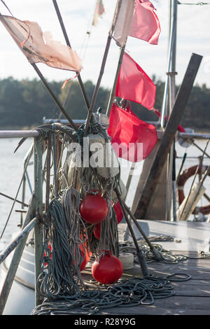 Buoy with red flag Stock Photo - Alamy