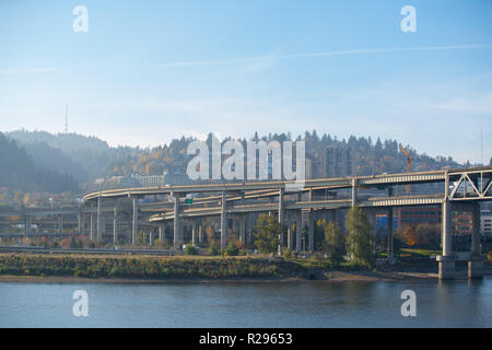 Portland, OR / USA - November 15 2018: Landscape with Portland highway bridges splitting into different directions over the Willamette river. Stock Photo