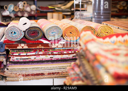 diversity of colour carpets in the store for home decor Stock Photo